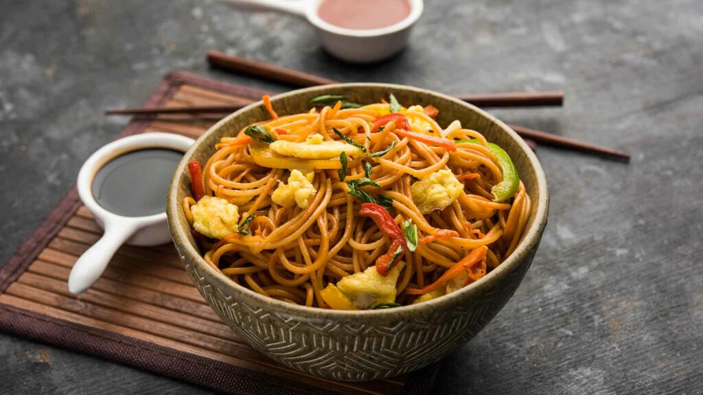 Spicy schezwan noodles cooked in a Geek Robocook Automatic Electric Pressure cooker