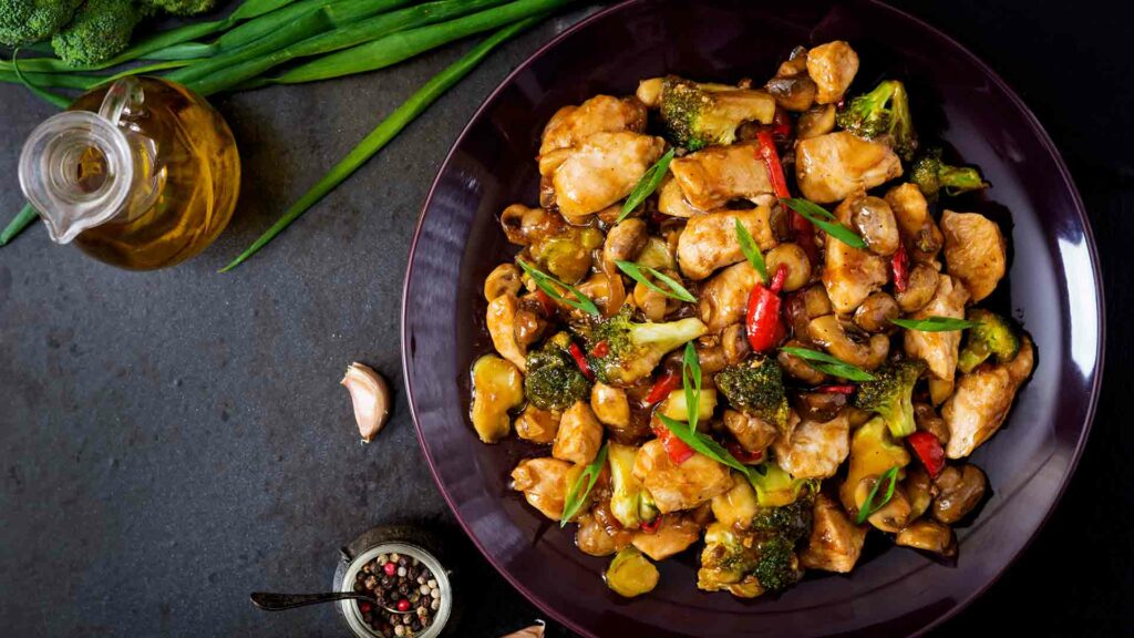 Stir fry chicken with ginger and scallions